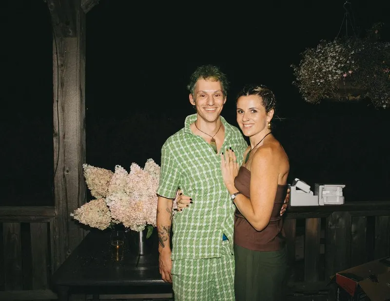 Aaron and Lana together at night after a ceremony